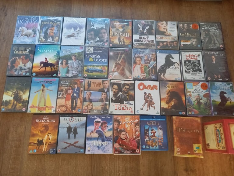 job lot of dvds. all sealed/ sellable conditon. movies/ films/ t.v series/ box sets
