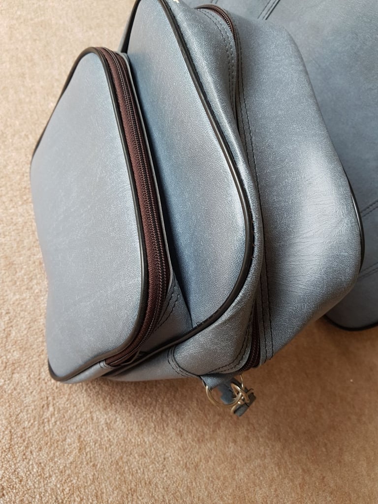 Small suitcase and matching bag 