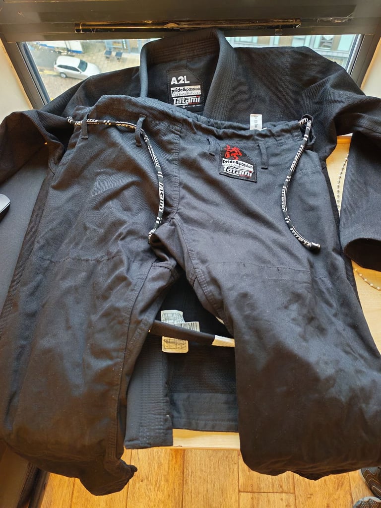 Tatami™  bjj gi with white belt, size A2L, used less than a week.  