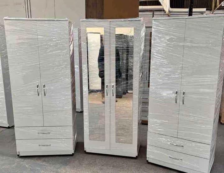 Modern Bedroom Furniture. Bedroom Suit Includes Bedside Tables, Chest of Drawers and Wardrobes