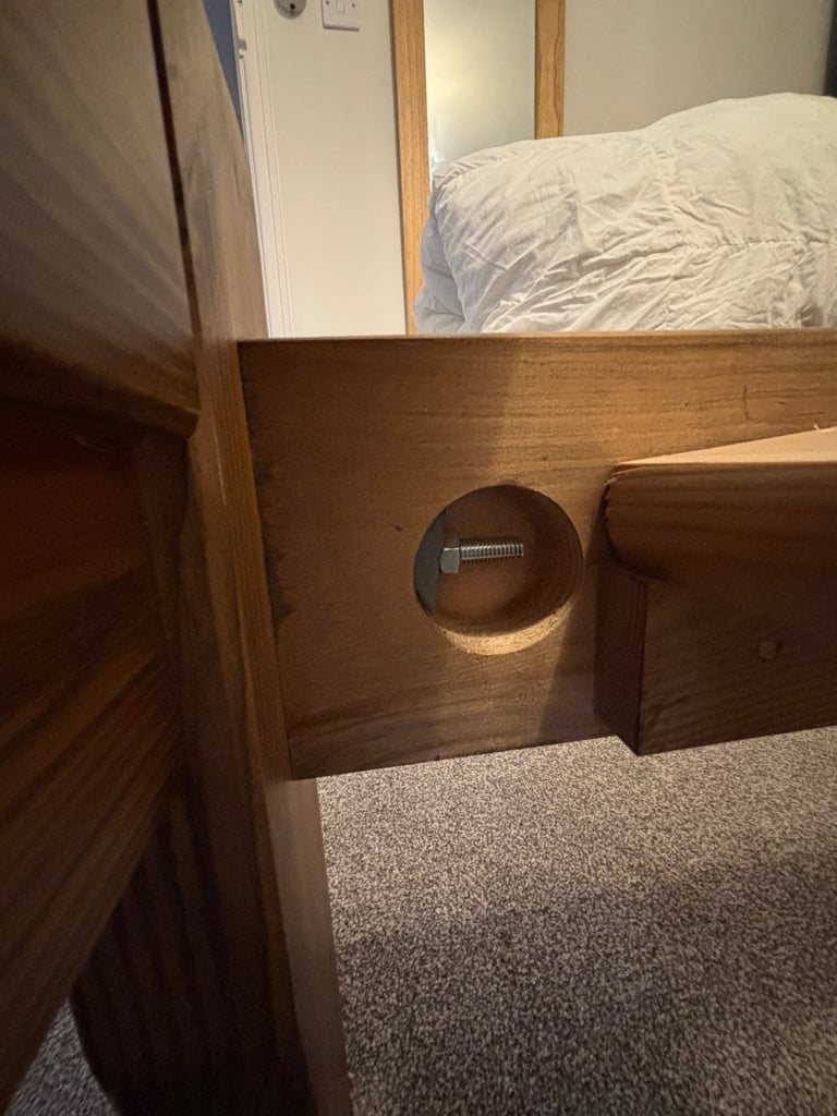 Pine bed frame with oak finish