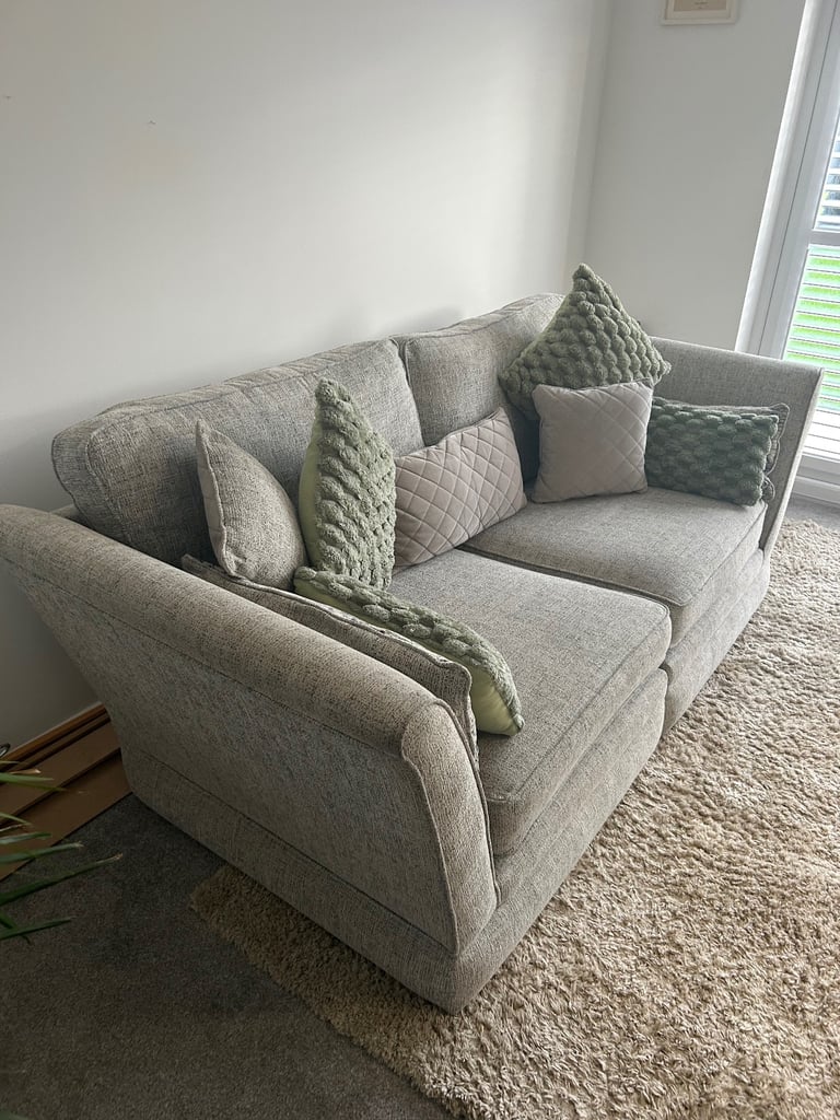 Just in Time for Christmas!! Large 3 seater couch with love chair and a free pouffie 