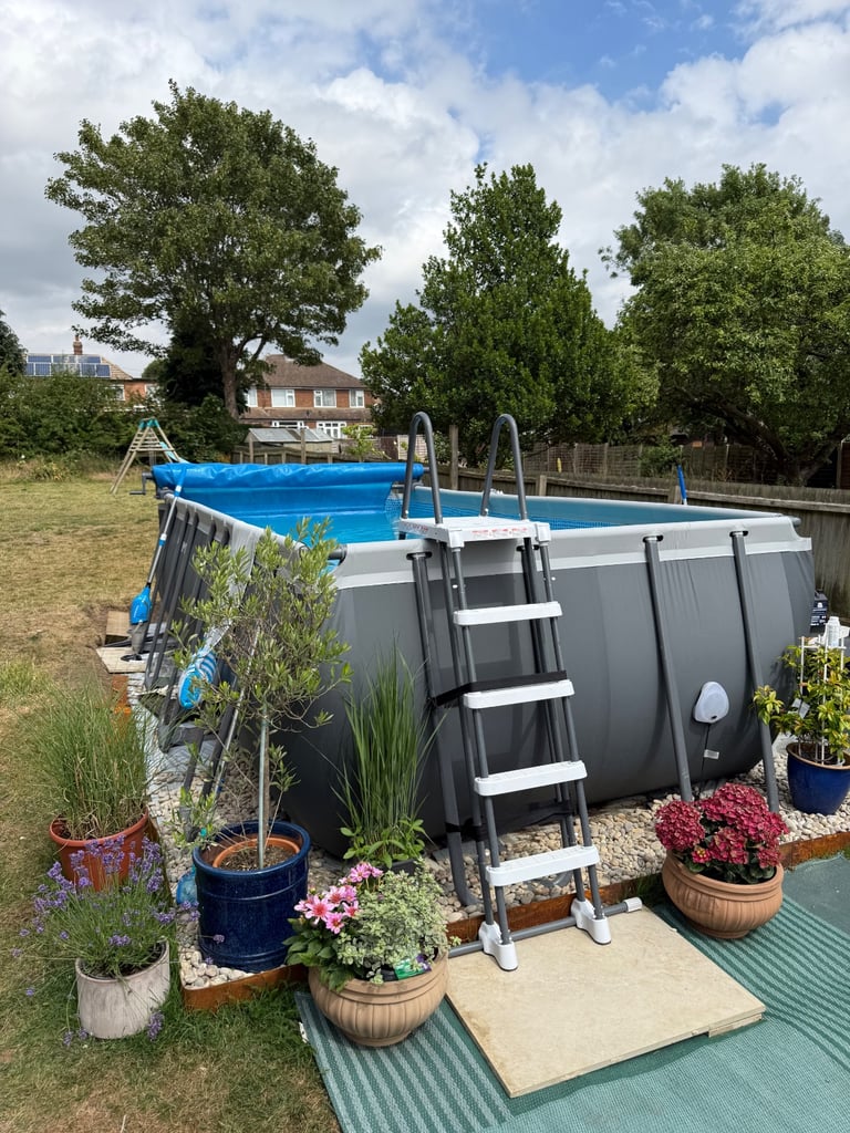 Intex XTR swimming pool rectangular 18' x 9' x 52 inches; filter, pump, ladder, cover, vacuum