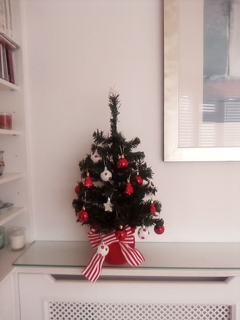 As new small Christmas tree with hanging baubles etc included.