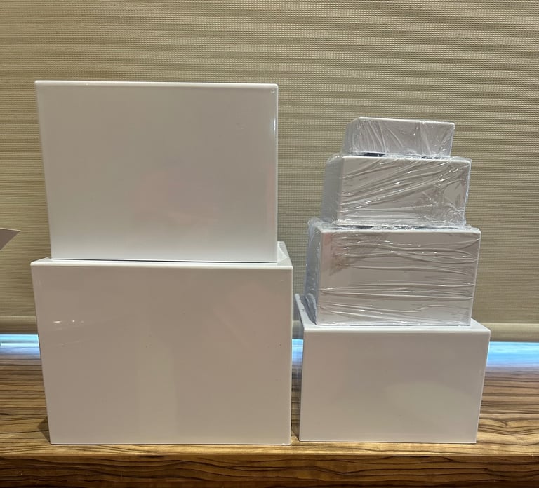 image for 6 white acrylic buffet risers / display stands 