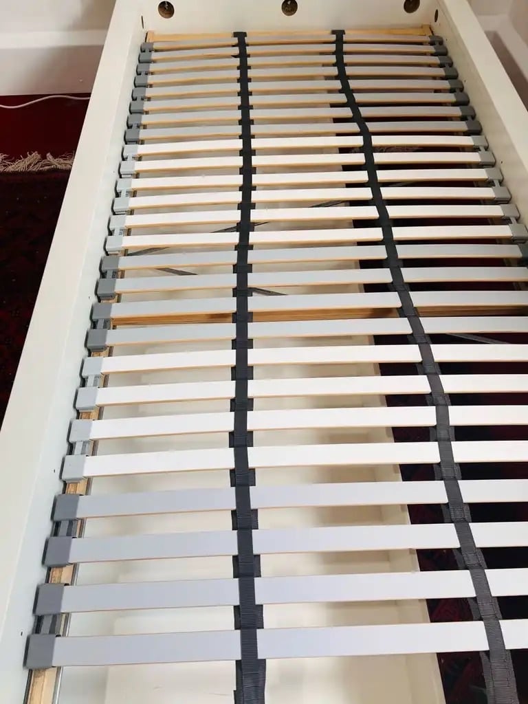 Ikea bed with storage drawers and slated bed base