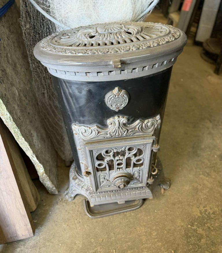 Secondhand Cast Iron Wood / Coal Burning Stove