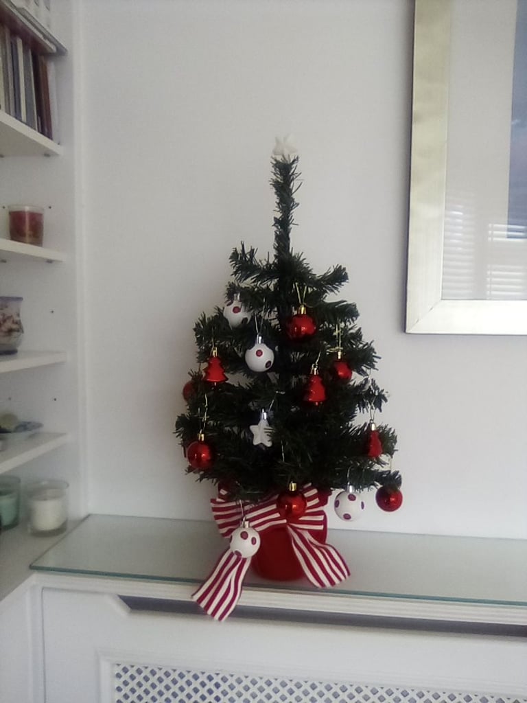 As new small Christmas tree with hanging baubles etc included.