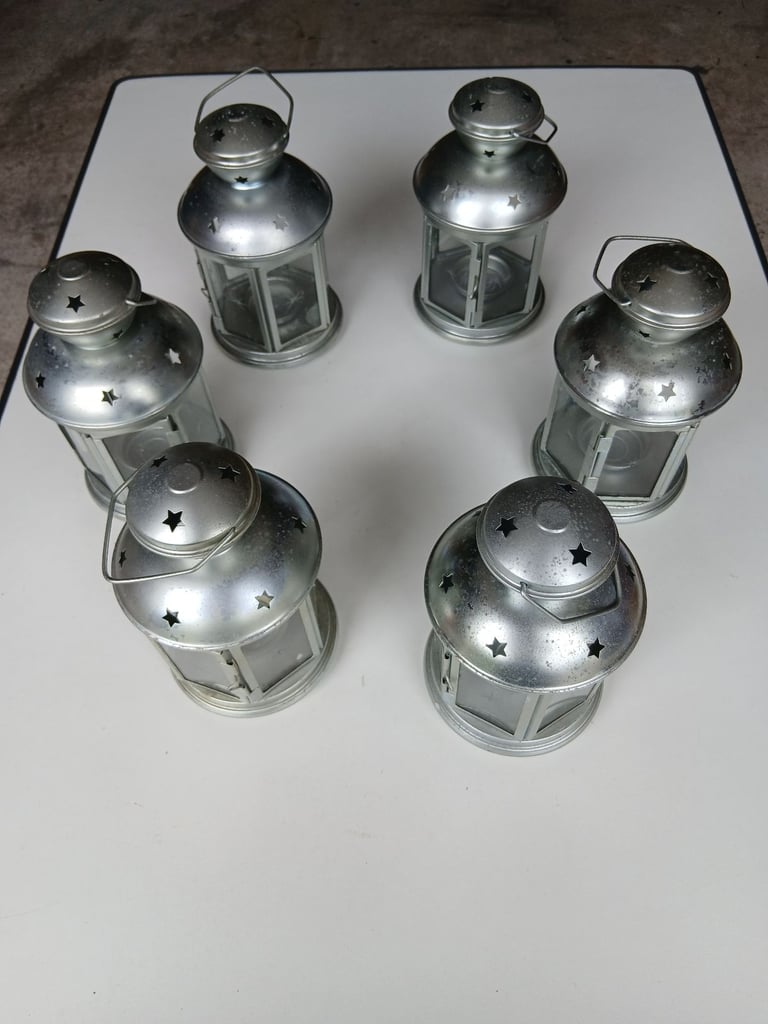 Six garden lanterns with six metal stakes