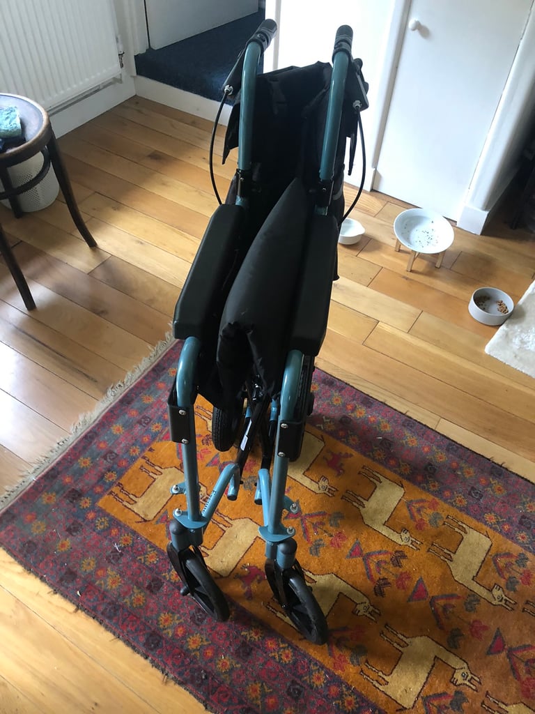 Wheelchair, new condition - light weight and compact