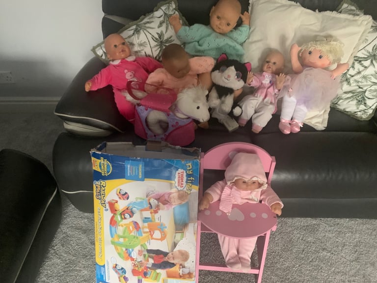 Assortment of child’s dolls and tous