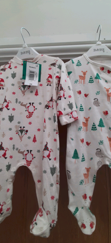 Newborn  baby grows xmasy design 