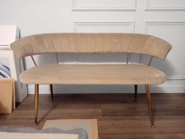Small, compact, beige sofa
