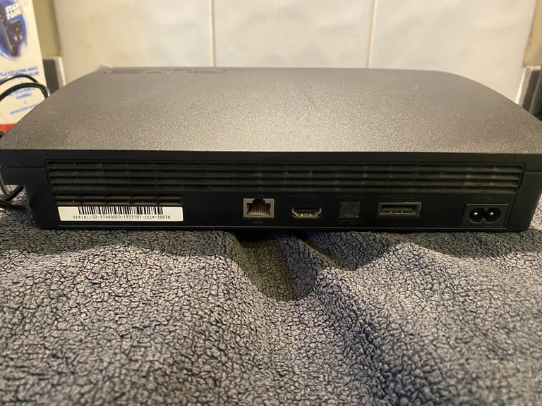 PS3 with 9 games and controller 