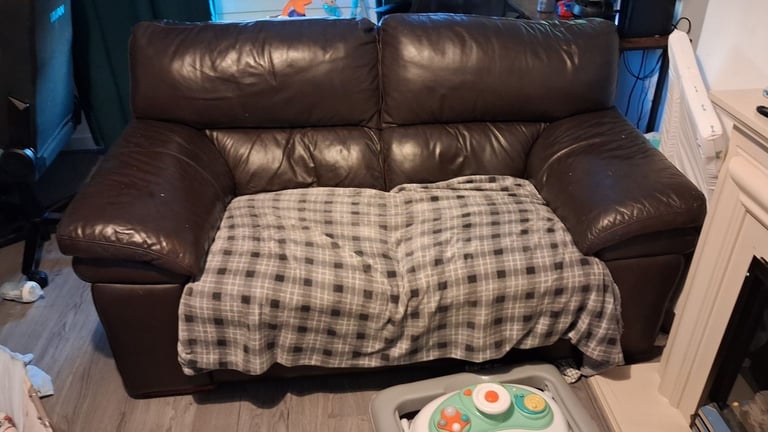 Free 2  seater leather couch 