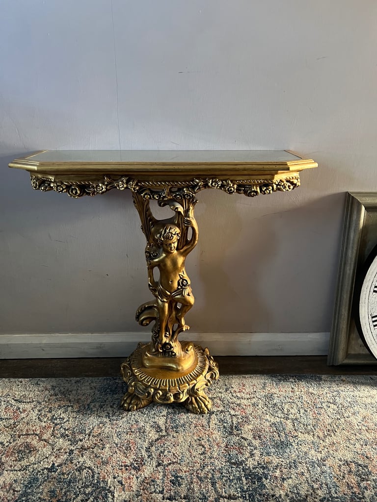Lovely ornate cherub console table