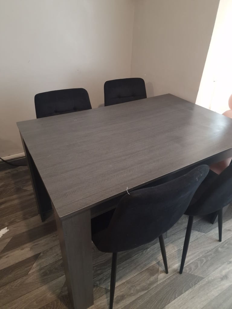 Dinner table with chairs