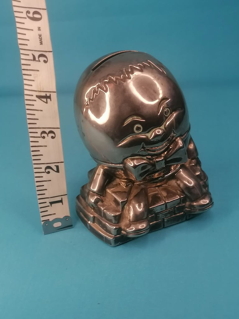 Vintage Humpty Dumpty Silver Plated Metal Coin Bank Money Box.. Missing one part.