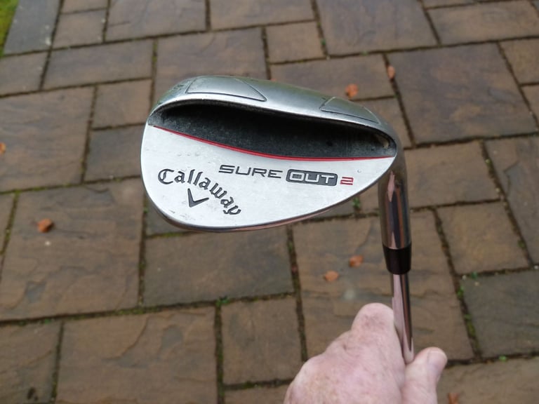Callaway "SURE OUT 2" 64 degree sand wedge.