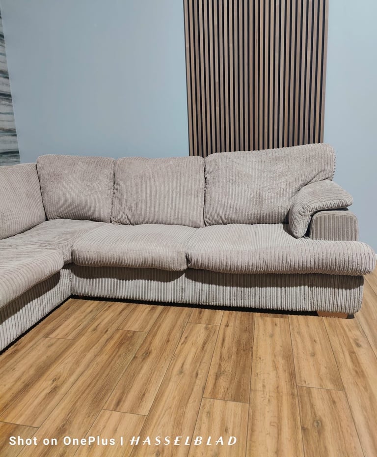 Large beige DFS Corner Sofa Bed  with footstool + free delivery
