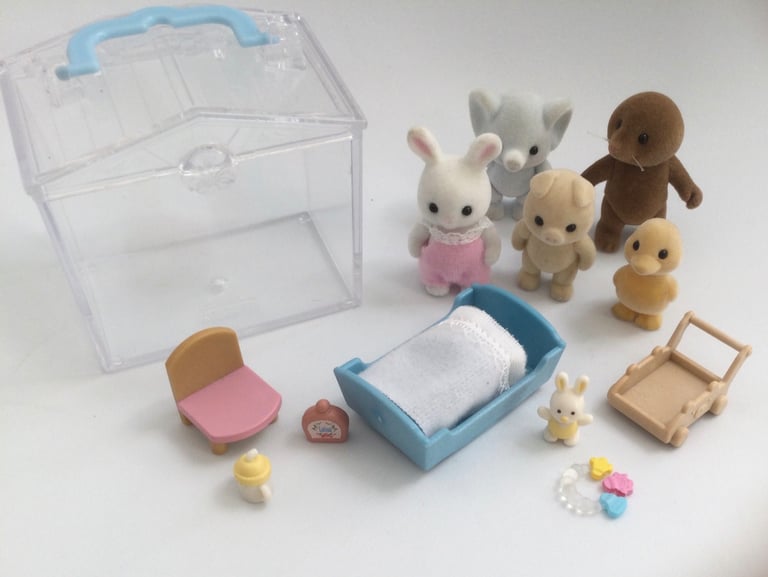 Bundle of Sylvanian Families babies with carry case, crib, walker, accessories 
