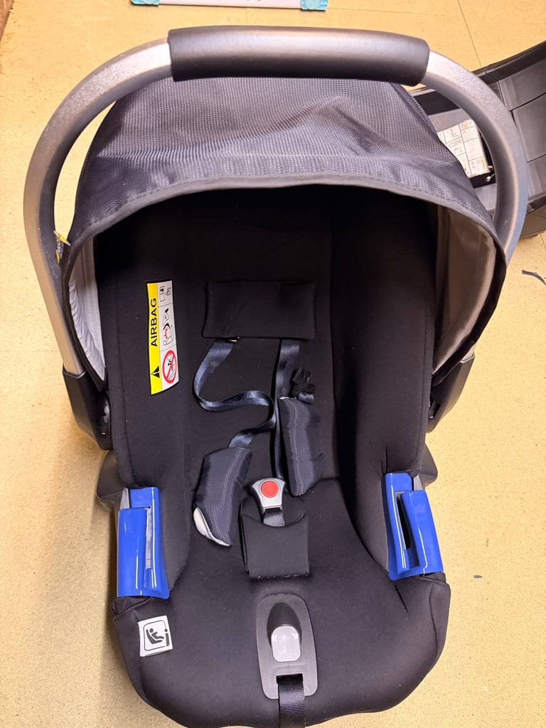 New born car seat with base in very good condition for sale 