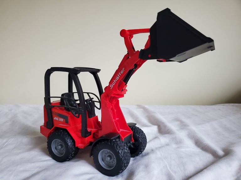 Bruder Farm Vehicle Digger With Hay Bale