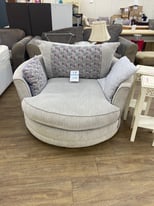 Grey swivel cuddle chair 