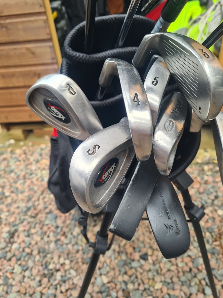 Full set of golf clubs.