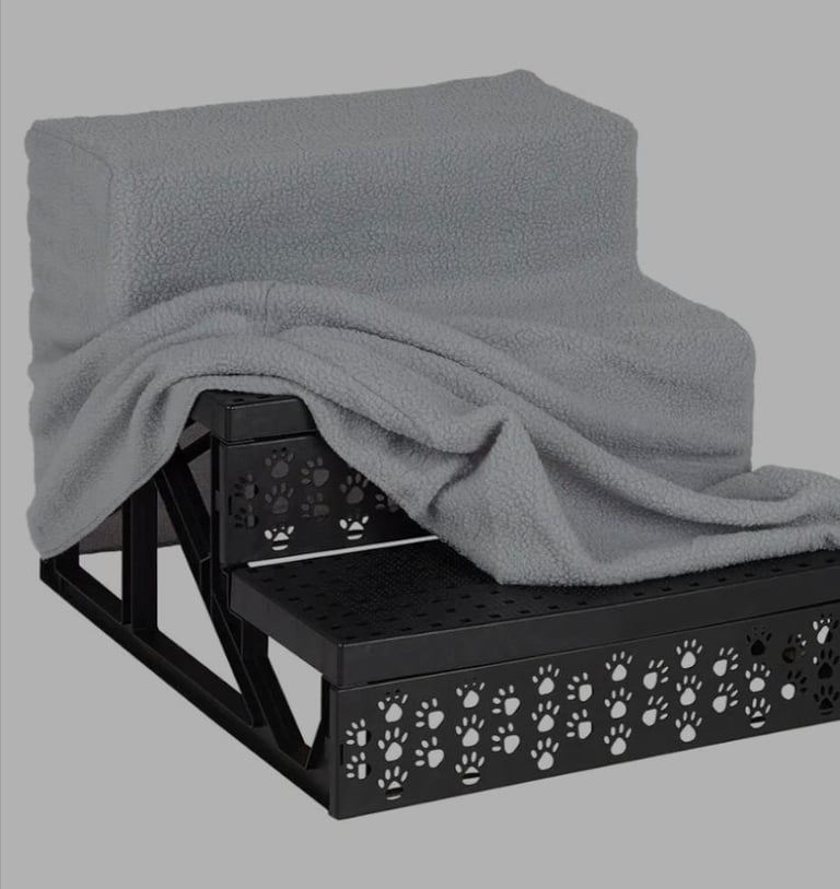 A new already built plastic 3 step pet stairs with grey cover the 