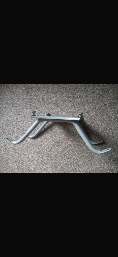 Lambretta Series 1 /2 inside legshields spare wheel holder.