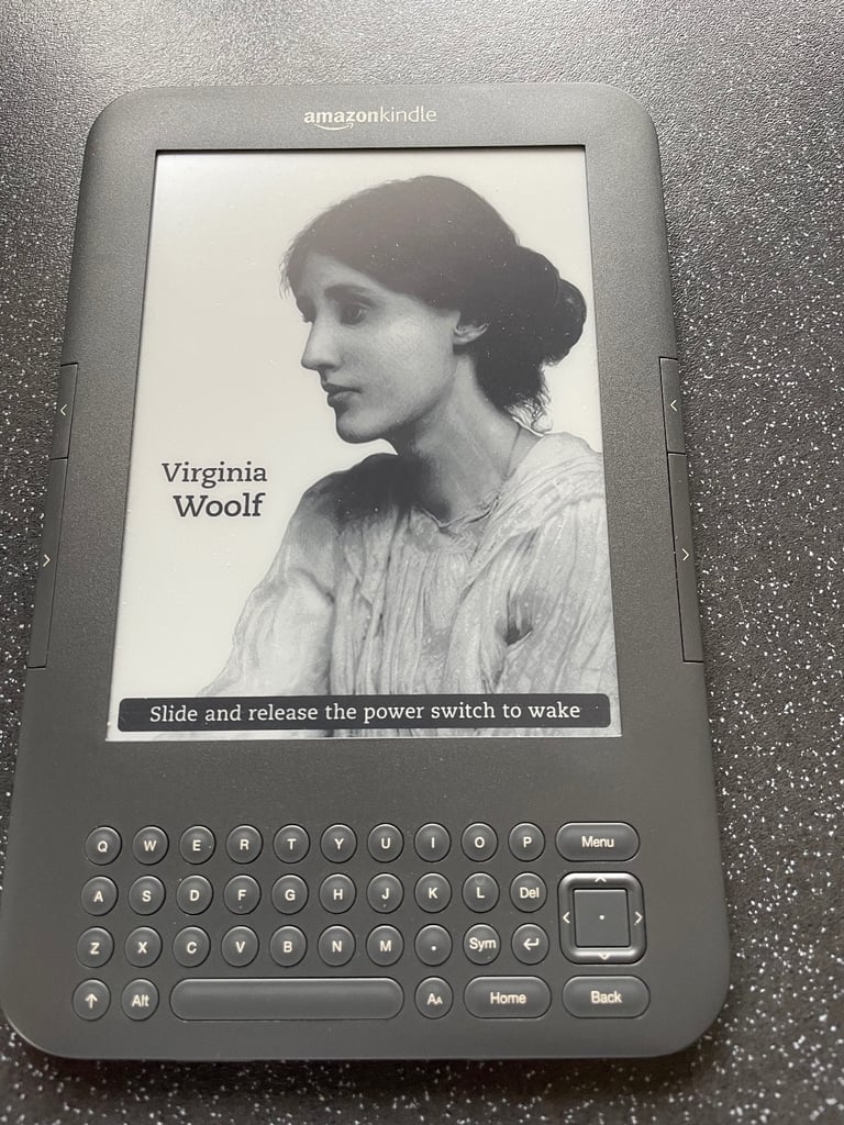 image for Amazon Kindle 3rd gen with case and charging cable 