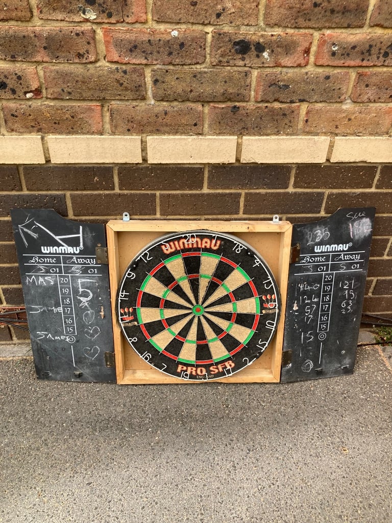 Winmau dartboard with cabinet