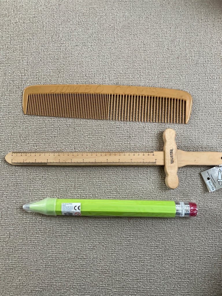 image for Novelty items ideal for Christmas: Jumbo comb/Giant pencil/Wooden ruler. £12 for all. Collect Fulham