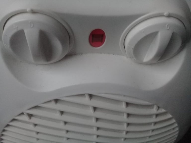 Portable electric fan heater oscillating setting. Pick up Bolton