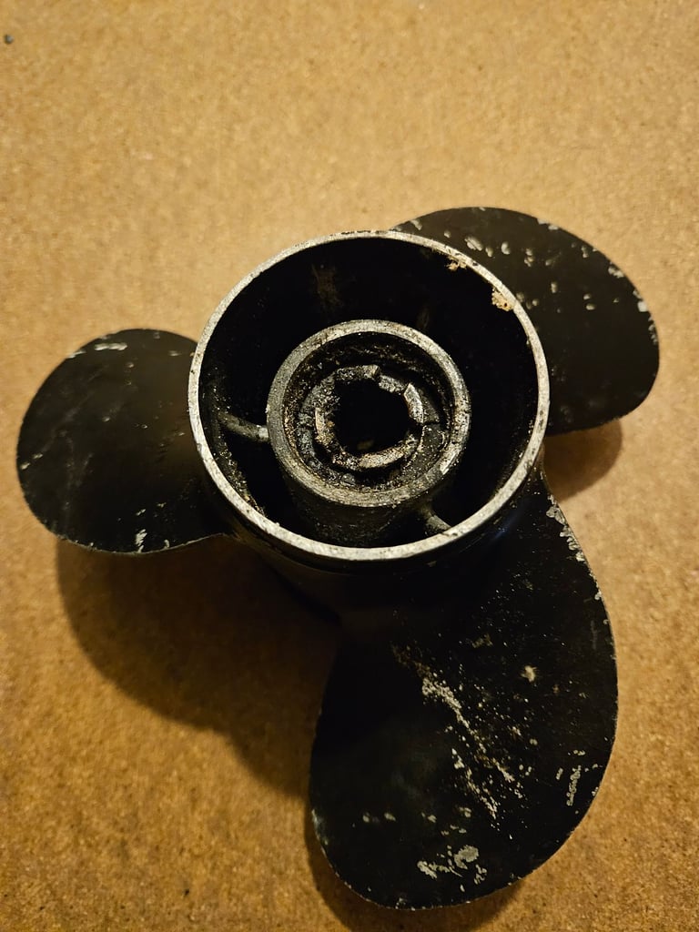 Evinrude outboard propeller. 8" diameter 