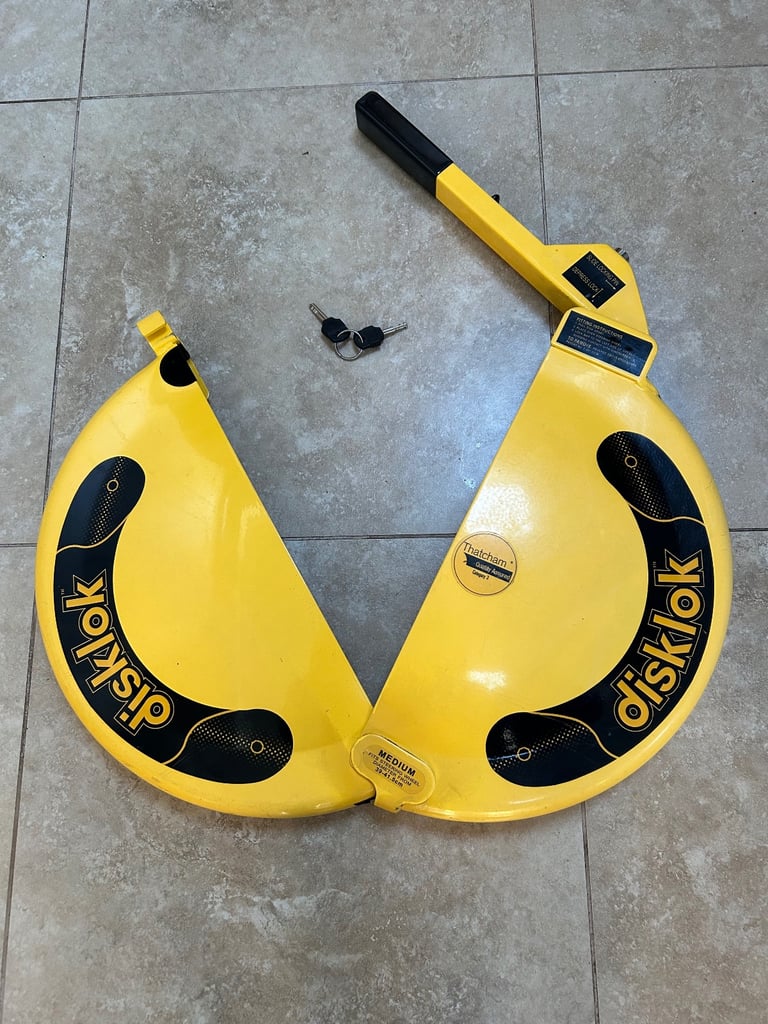 Disklok steering wheel vehicle security