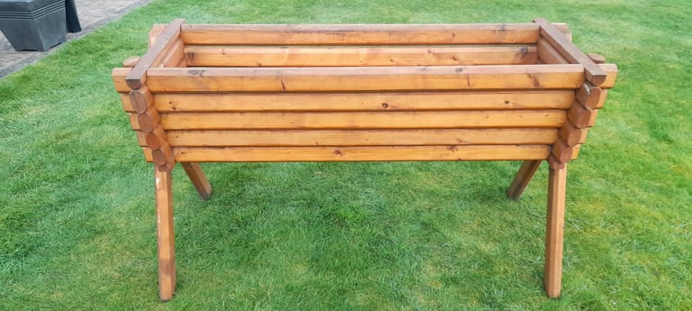 image for Planter.  Wooden log style