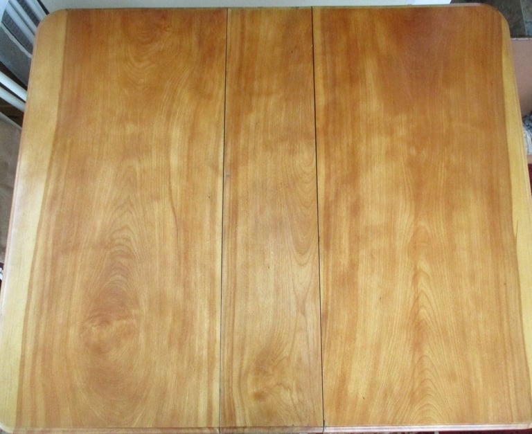 Original old Sutherland table. Original casters on feet.