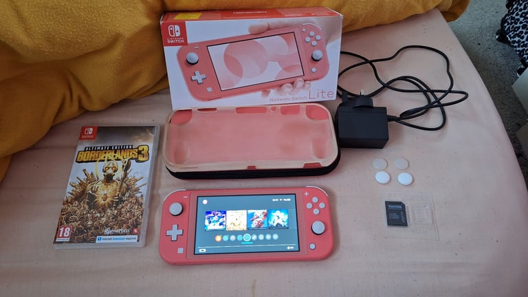 image for Nintendo switch lite coral pink 