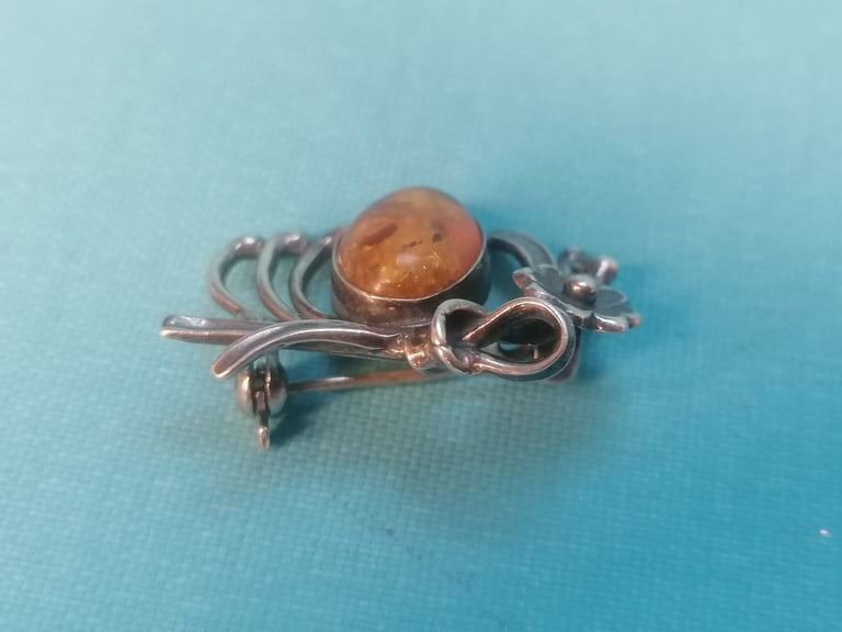 A Lovely Vintage Silver  with Baltic see Amber stone Brooch.  