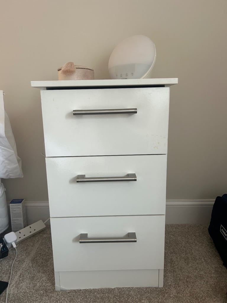 White bedside table with drawers