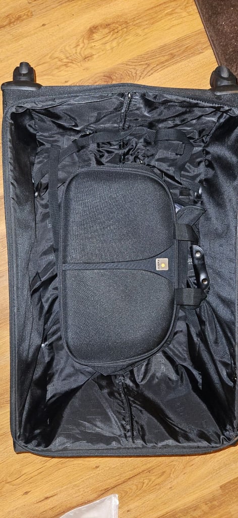 Trip LARGE Suitcase with extra small bag.