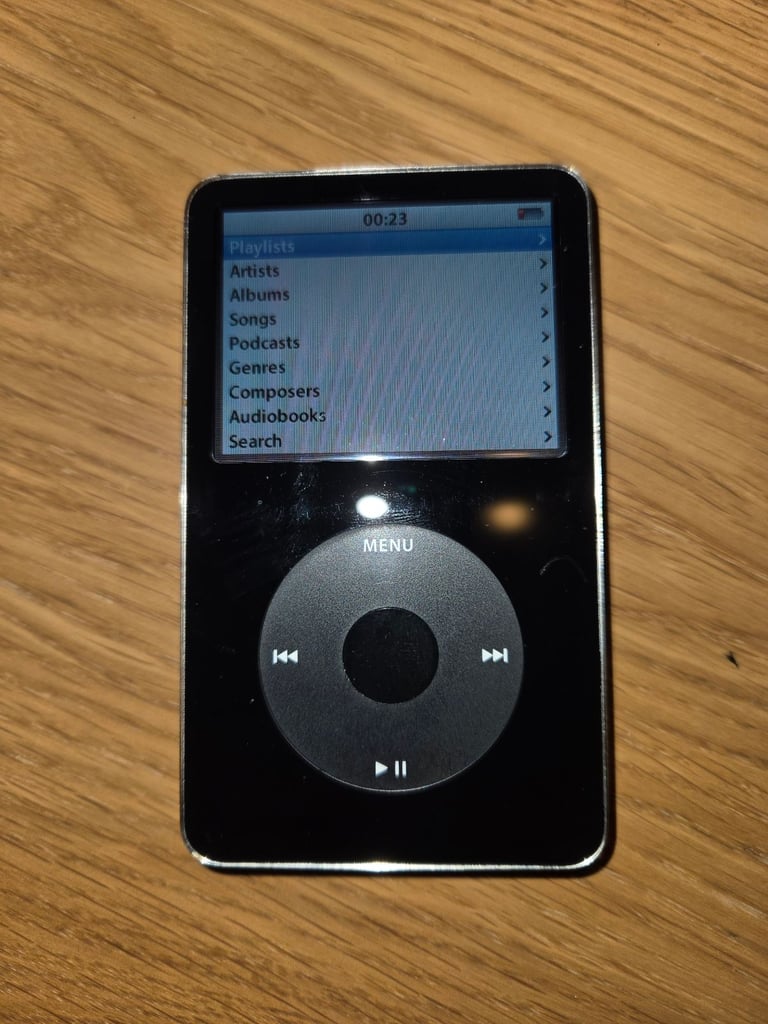 Ipod Classic 30GB 5th Generation Black, A1136.  Charge cable, headphones and case.