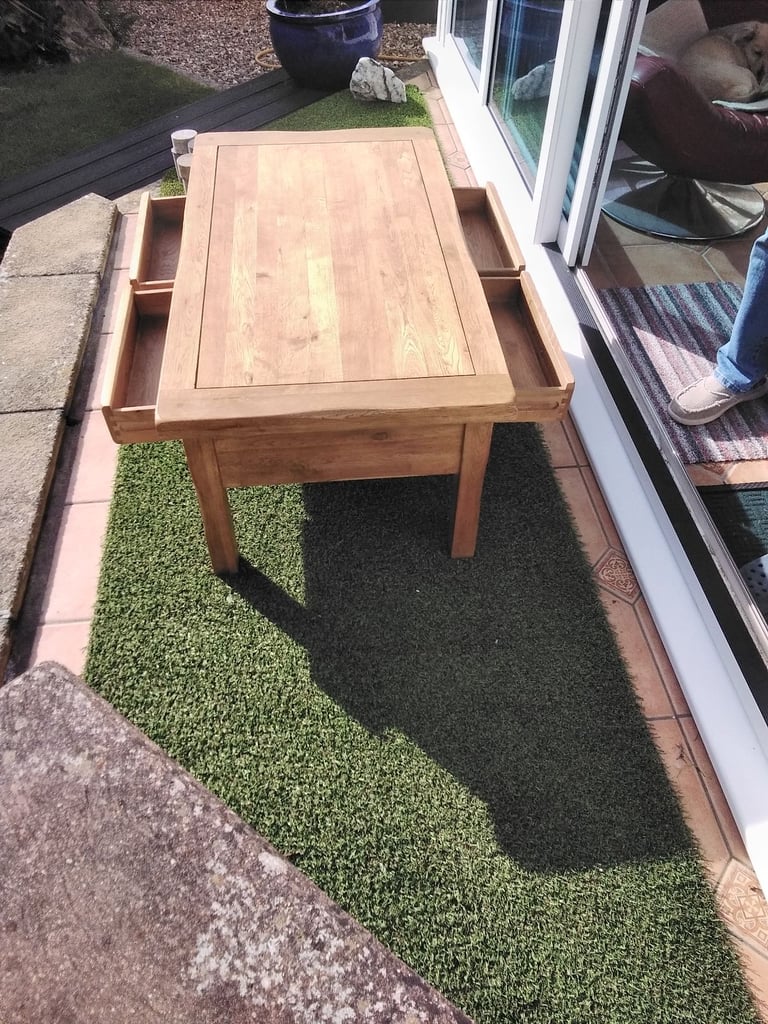 image for Solid oak 4 drawer coffee table