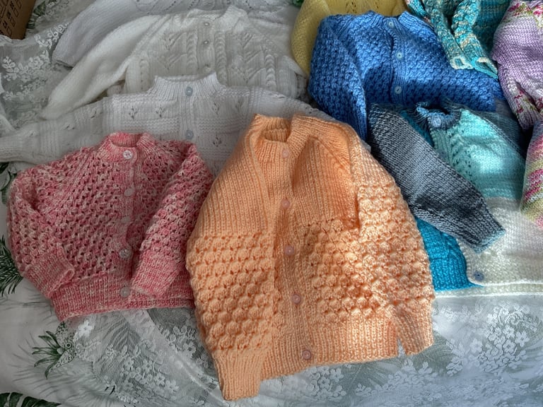 Baby cardigans/jackets etc, blankets and shawls, all hand knitted