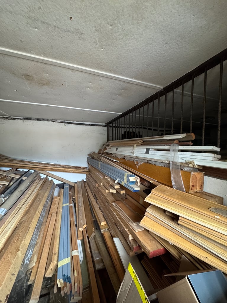 Stable full of off cuts of hard and soft wood 