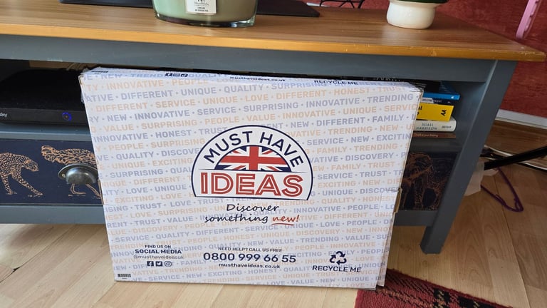 image for Four new, unopened, adjustable tables