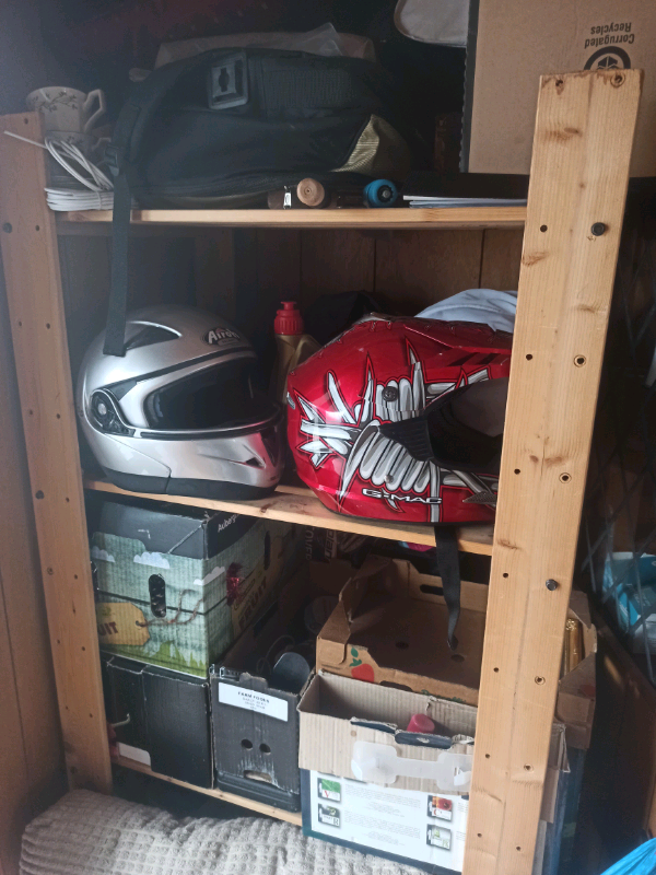 Spare motorcycle helmets. 
