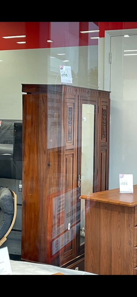 Beautiful dark wood wardrobe with carved flower inlay 